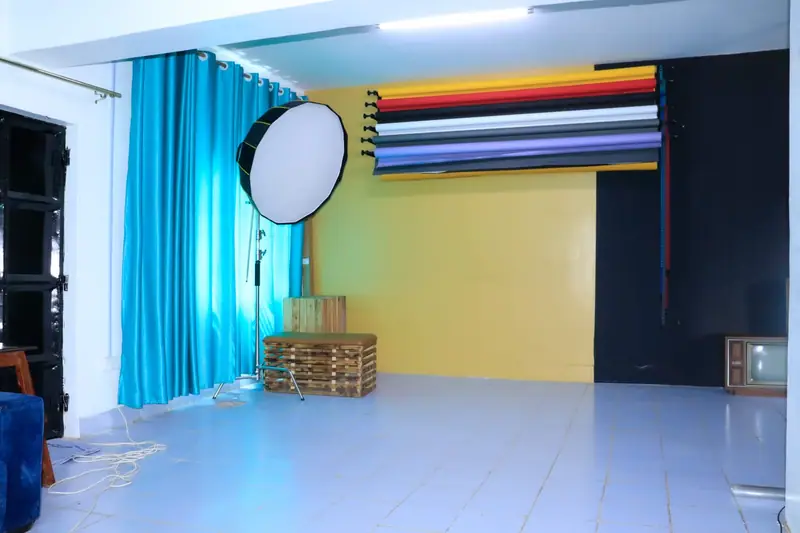 Studio shooting area with professional lights and colour backdrops